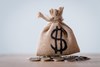 stock-photo-sackcloth-money-bag-dollar-sign-metal-coins-isolated-grey